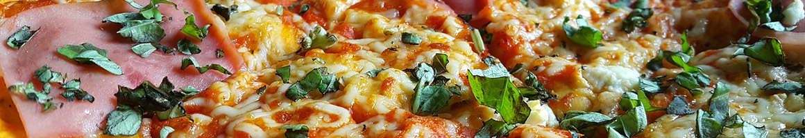 Eating Italian Pizza at Venezia Pizza & Pasta restaurant in Clifton Park, NY.